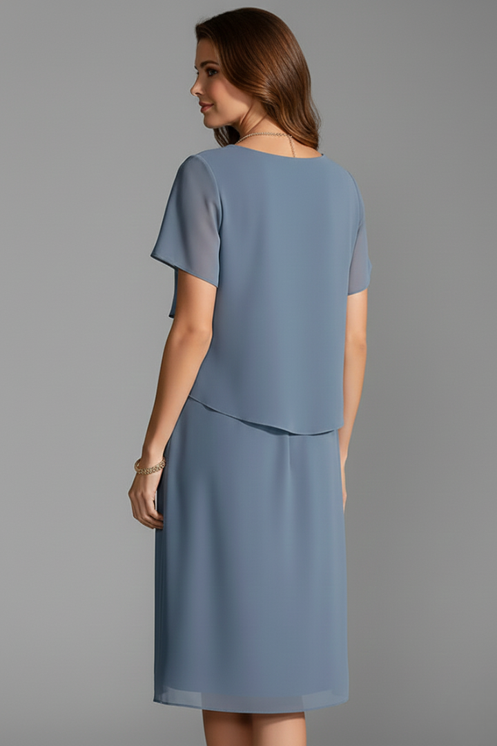 Versatile women's short sleeve dress with a unique layered front design. Knee-length, straight fit, ideal for casual comfort.