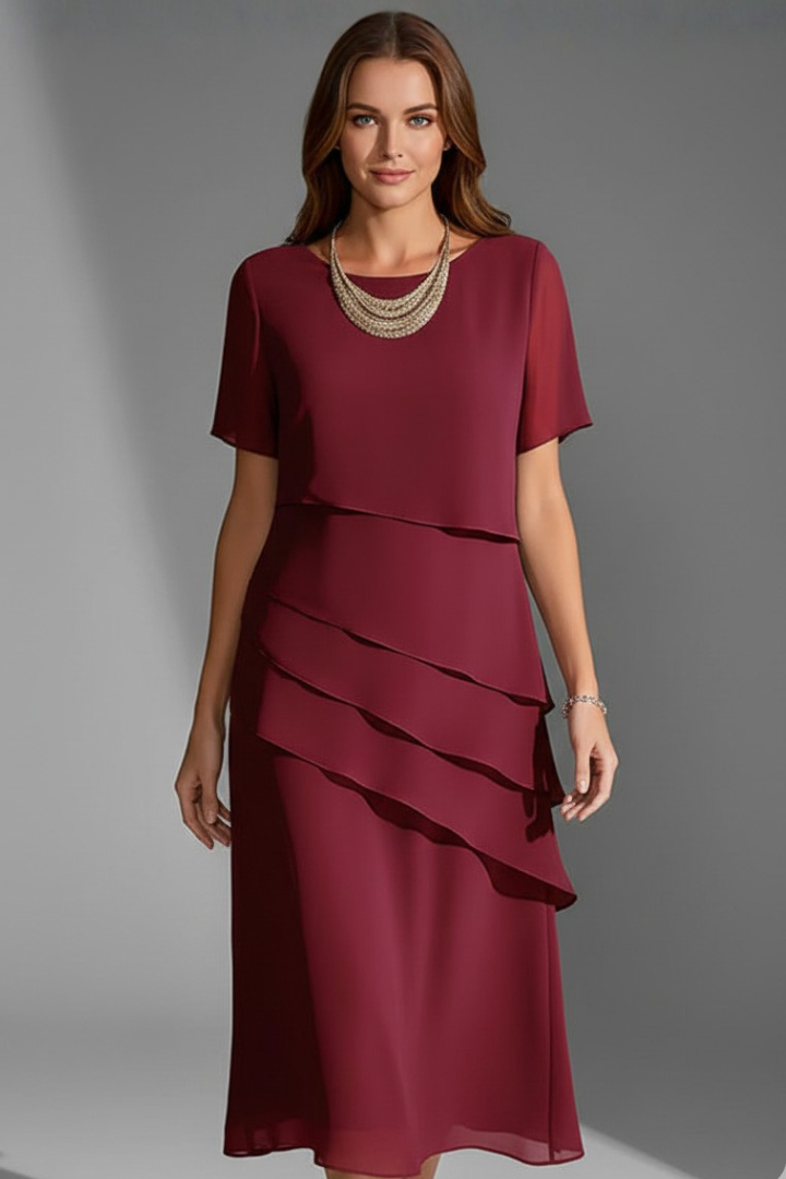 Everyday women's short sleeve dress with a modern layered front. Straight hem and round neck for a relaxed, comfortable fit.