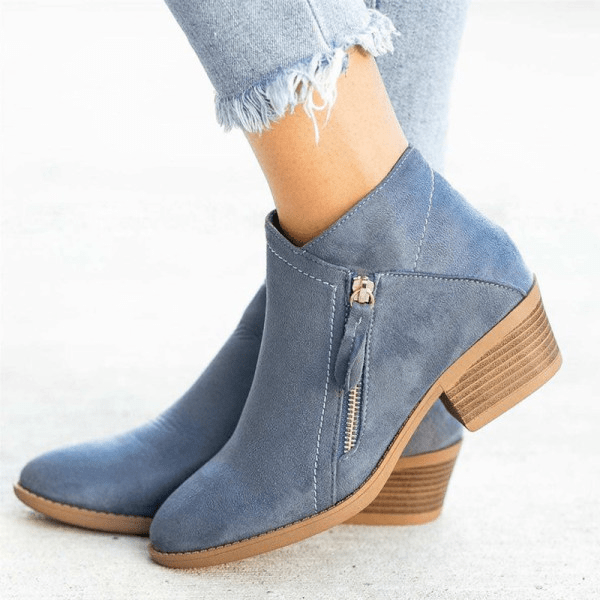 Women's side zip block heel ankle boots. Stylish pointed toe booties for casual everyday wear.