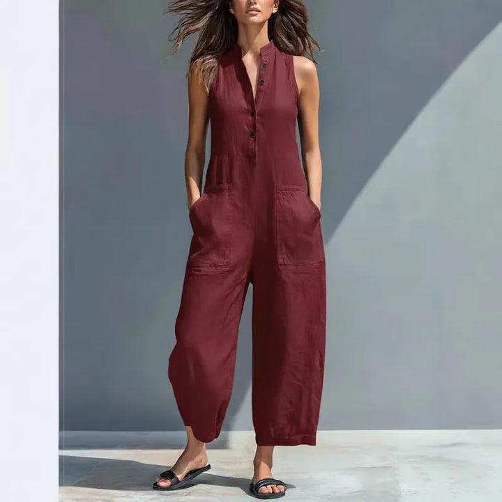 Elegant women's sleeveless full-length jumpsuit, button-up front, stand collar, spring/summer ready.