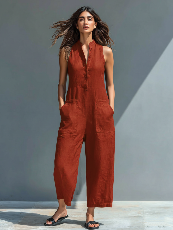 Casual women's sleeveless jumpsuit, loose fit, button-up, great for spring/summer travel.