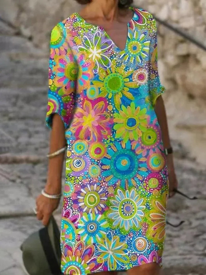 Elegant women's sleeveless floral maxi dress with a flowy silhouette, ideal for warm weather fashion.