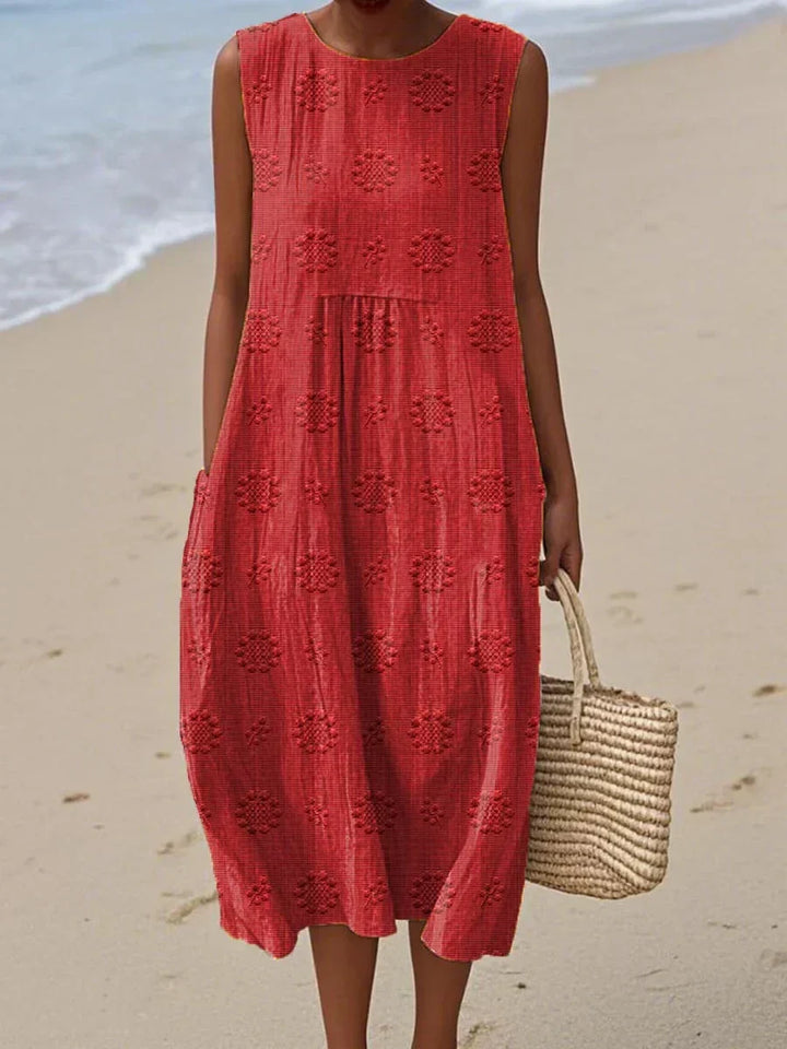 Round neck sleeveless midi dress for women. Elegant casual style, comfortable & flowy, perfect for summer days.