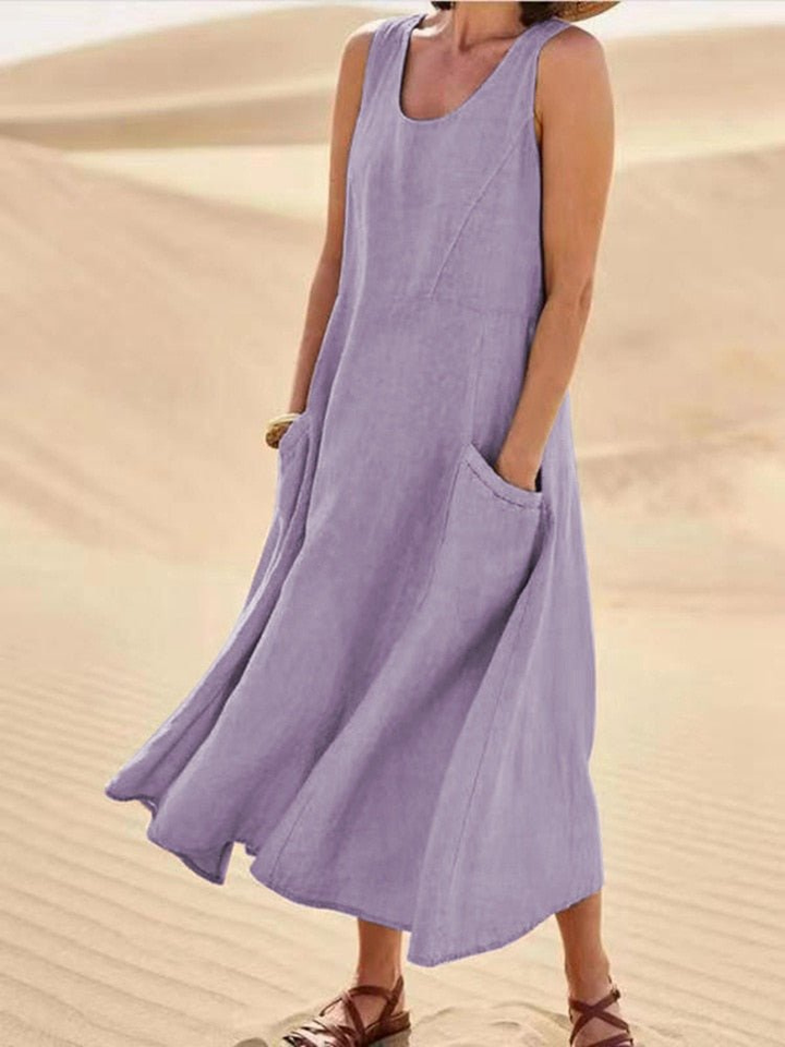 Relaxed fit women's sleeveless scoop-neck midi dress with pockets, great for beachwear & versatility.