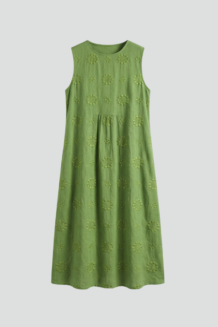 Women's sleeveless round neck midi dress with elegant textured pattern, perfect for summer casual wear.