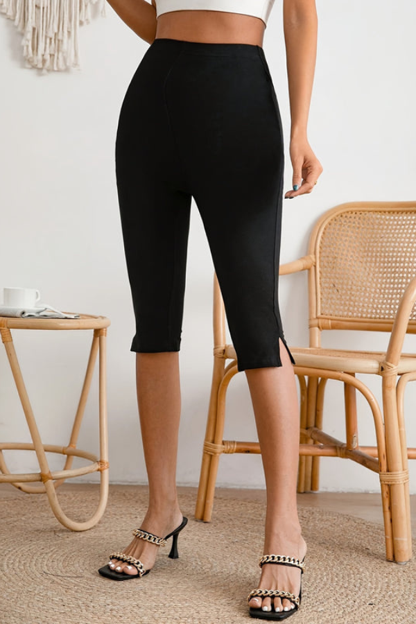 Women's slim-fit stretch cropped pants in black, perfect for versatile casual or office wear. Stylish & comfortable.