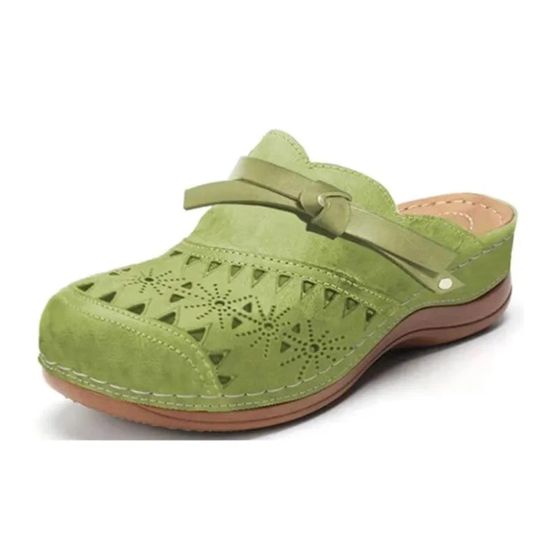 Comfortable women's slip-on clogs with a cute bow & cutout. Ideal everyday casual footwear.