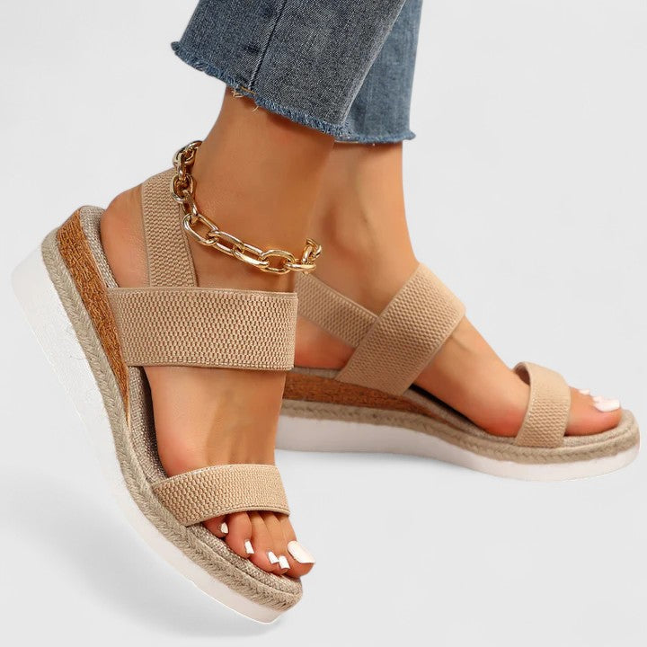 Women's slip-on espadrille wedge sandals with elastic straps, open toe, jute sole for all-day comfort.