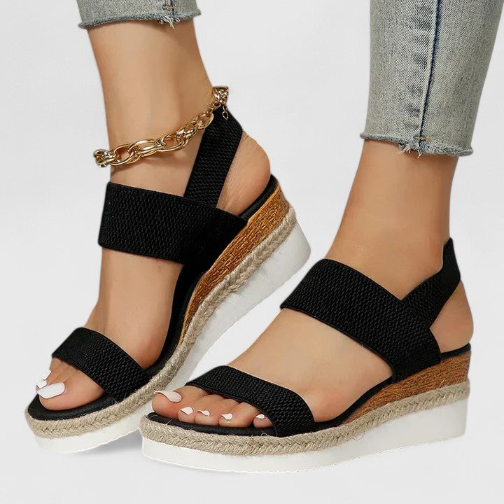 Fashionable women's slip-on espadrille wedge sandals, open-toe, elastic for summer comfort & casual style.
