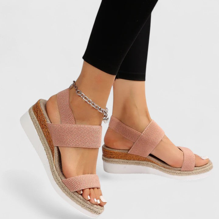 All-day comfortable women's slip-on espadrille wedge sandals with open toe, elastic straps, jute sole.