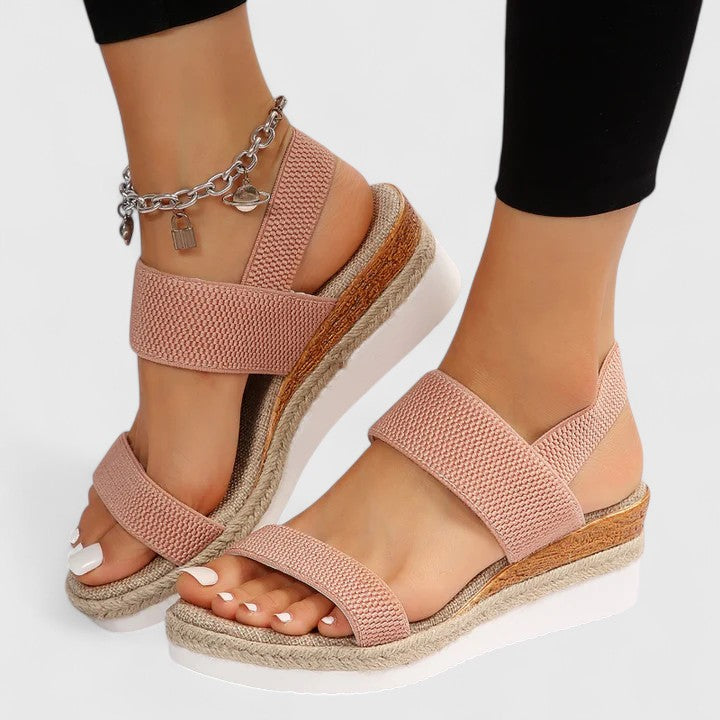 Stylish women's espadrille wedge sandals with comfortable jute sole, elastic straps, and open toe slip-on design.