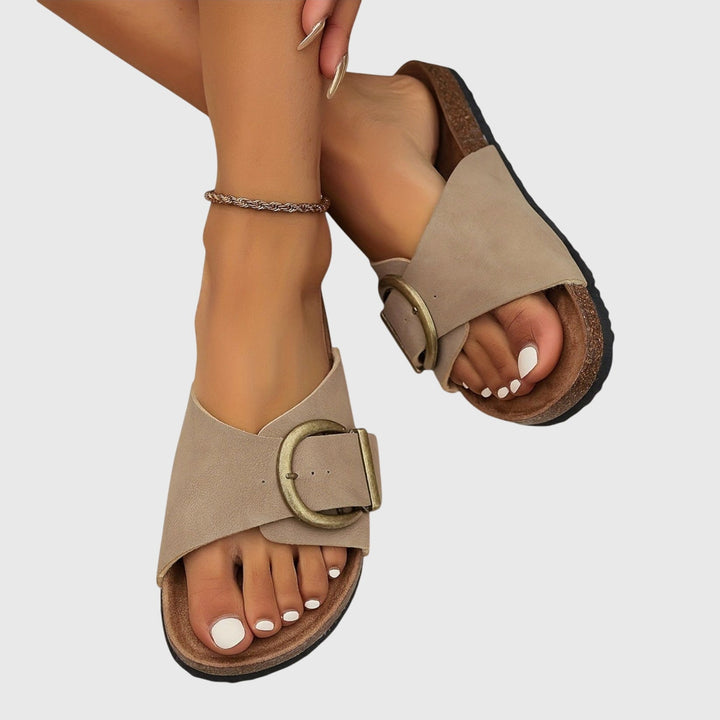 Comfortable women's orthopedic slip-on sandals with arch support, great for casual wear and walking.