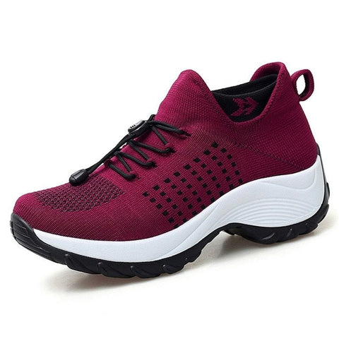 Easy slip-on women's athletic sneakers, featuring flexible design & cushioned support for everyday walking.