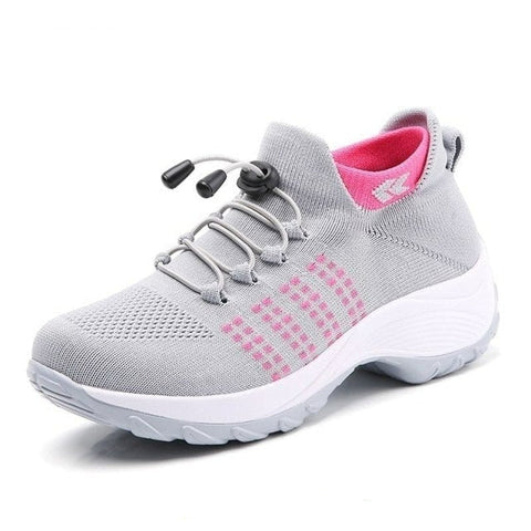 Stylish women's slip-on comfort sneakers, engineered for walking with soft cushioning & supportive fit.
