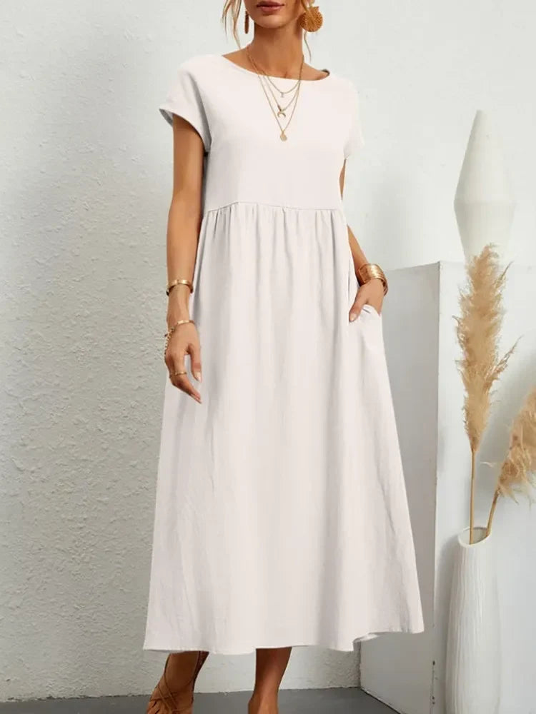 Comfortable short sleeve smock waist maxi dress for women, ideal for casual summer outfits and everyday wear.