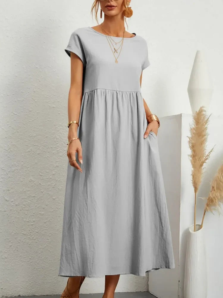 Versatile women's short sleeve smock waist maxi dress, perfect for casual spring and summer everyday wear.