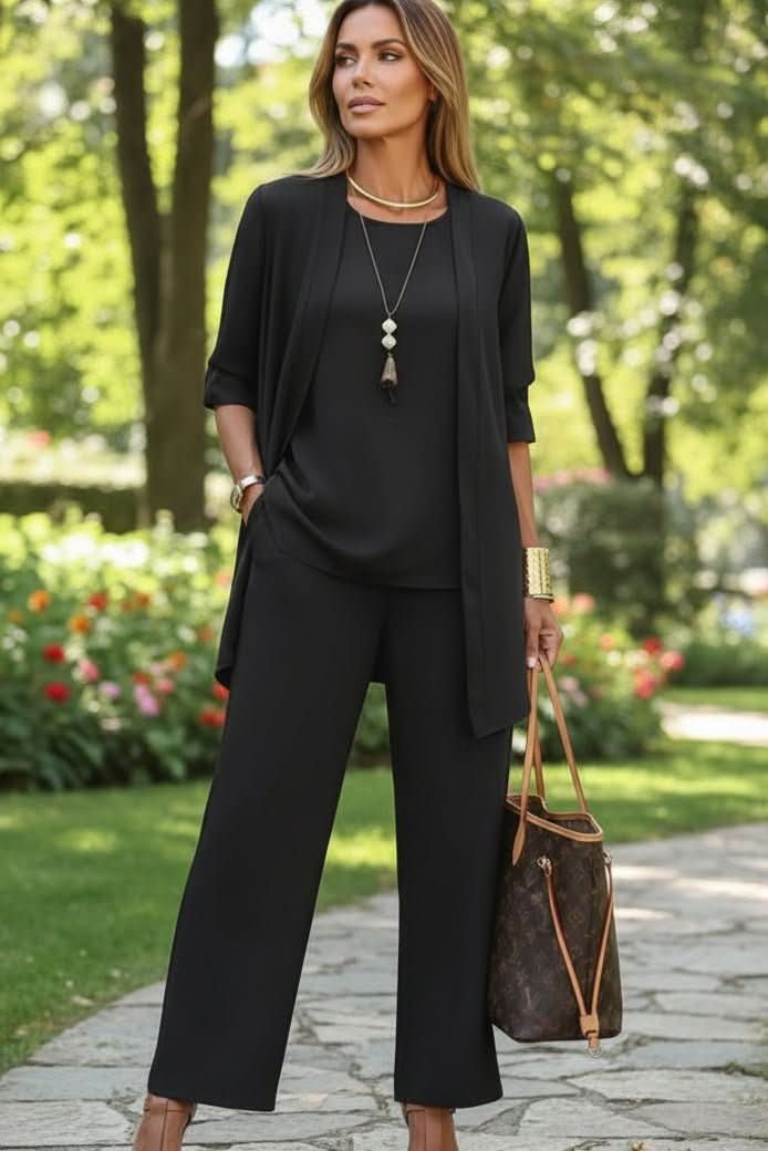 Stylish women's three-piece summer set: top, shorts & cardigan. Perfect for resort & vacation wear.