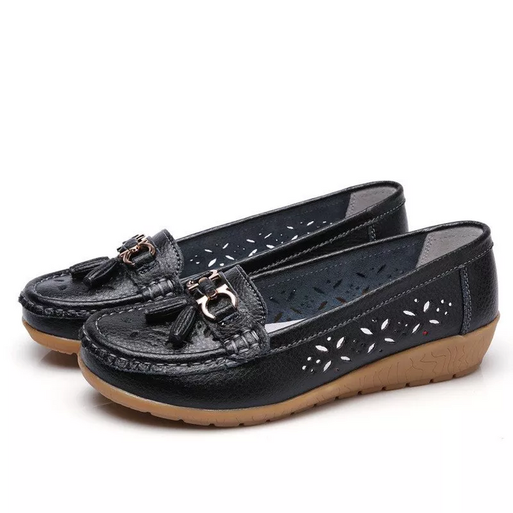 Soft breathable women's moccasin sandals, designed for all-day comfort.