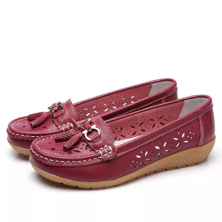 Elegant women's moccasin sandals, offering soft breathable walking comfort.