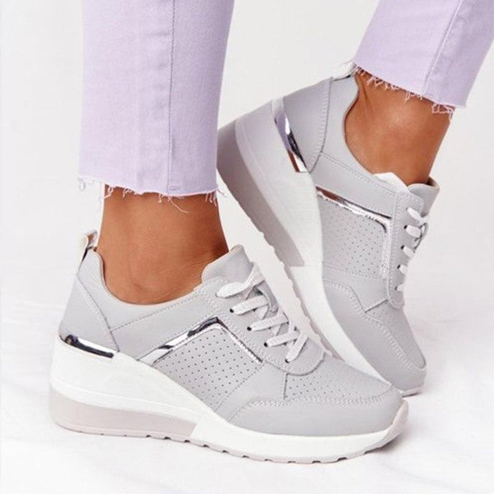 Breathable women's athletic walking shoes with soft cushioning & anti-slip sole. Perfect for daily wear.