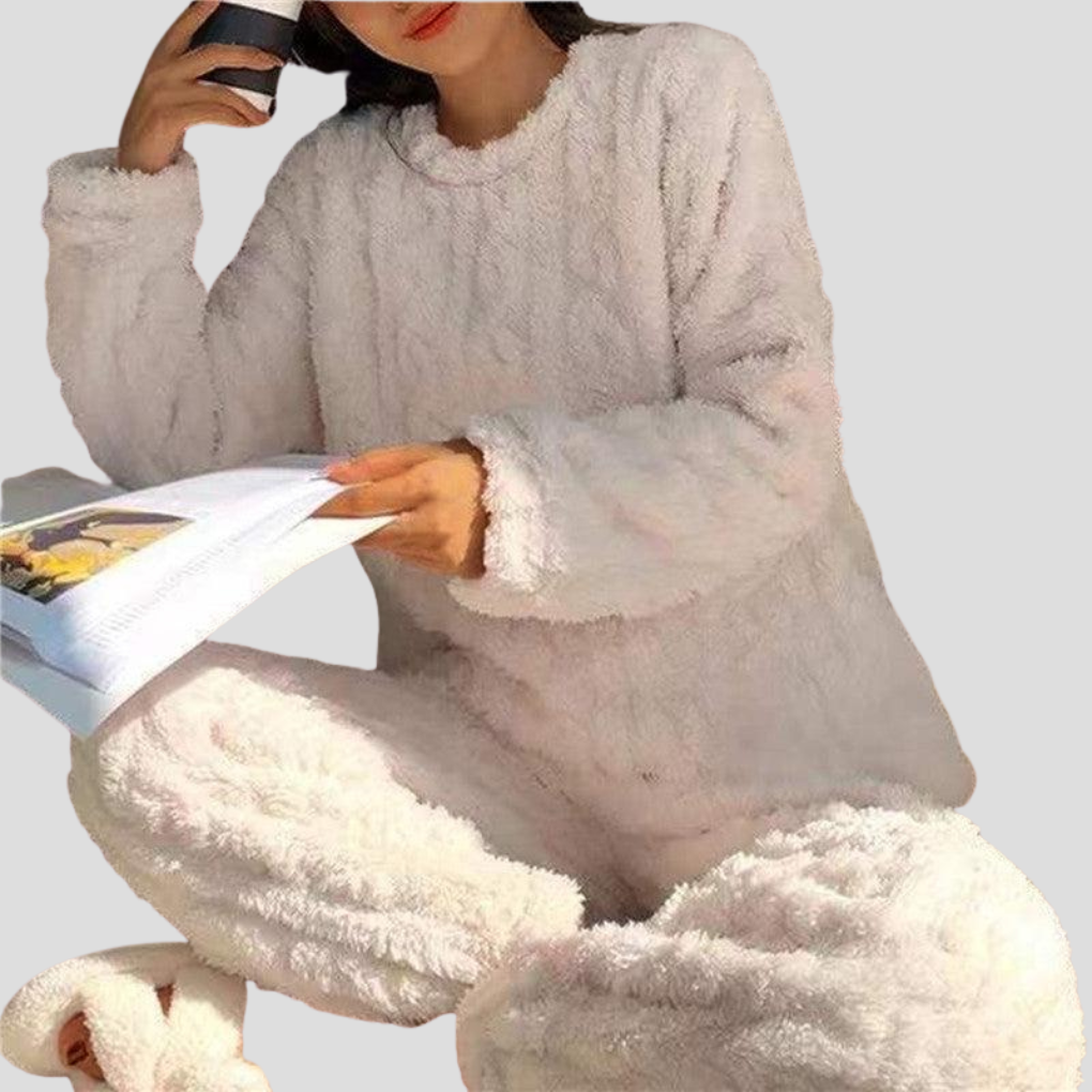 Cozy women's fleece pajama set for relaxing at home. Warm winter sleepwear & comfortable loungewear.