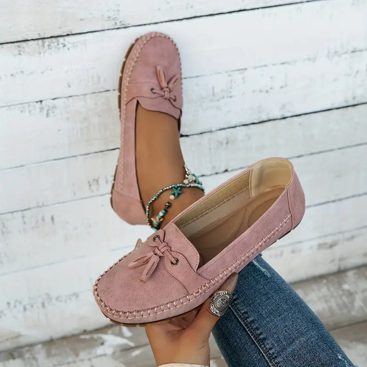 Comfortable ladies' flat shoes; soft loafers with supportive cushioned insole.
