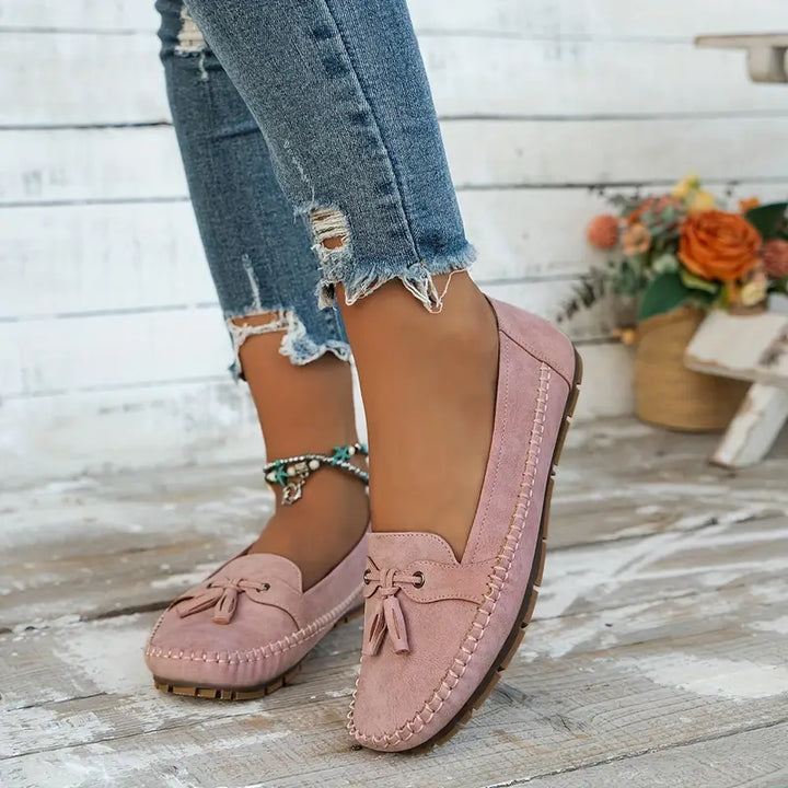 Brown women's comfort loafers; flexible sole & soft upper for all-day support.