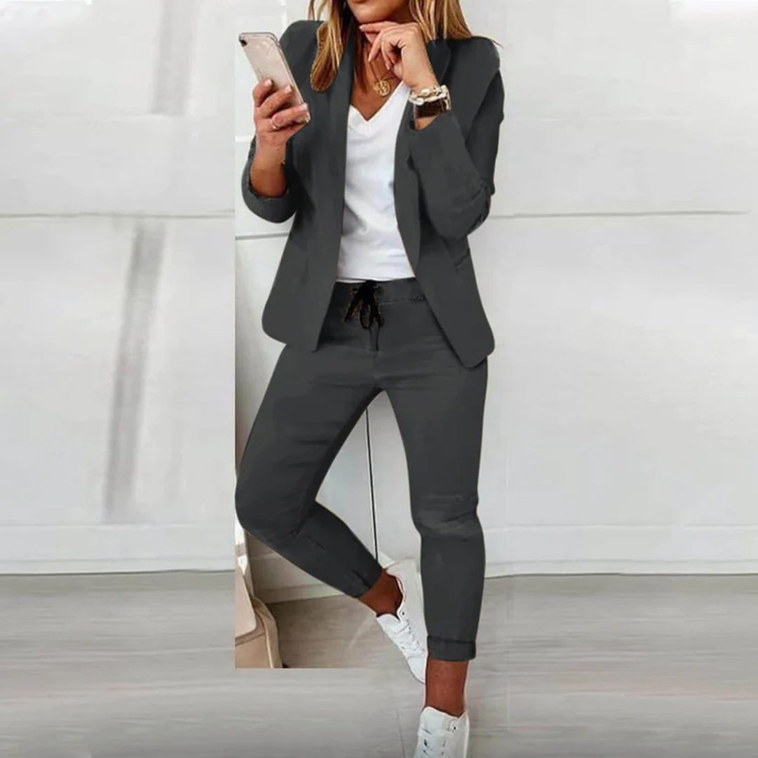 Elegant women's apparel: a blazer and jogger set suitable for lounge or desk