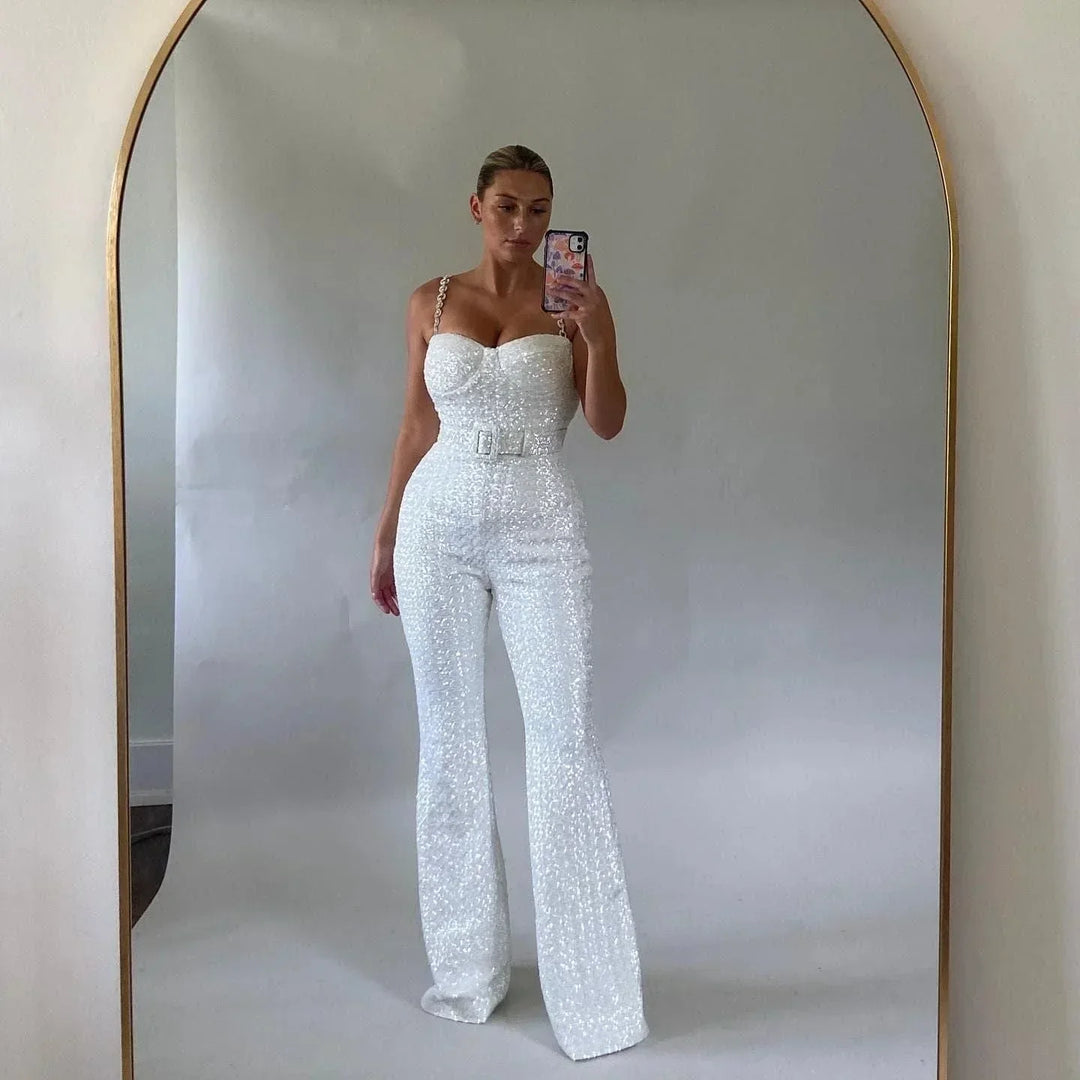 Chic women's strapless glitter jumpsuit, two-piece set, with waist belt for modern party wear.