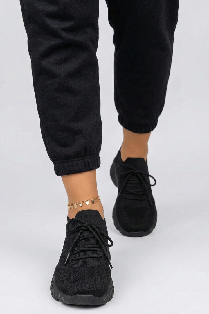 Comfortable women's athletic shoes, lace-up design, ideal for walking, running, & activewear.