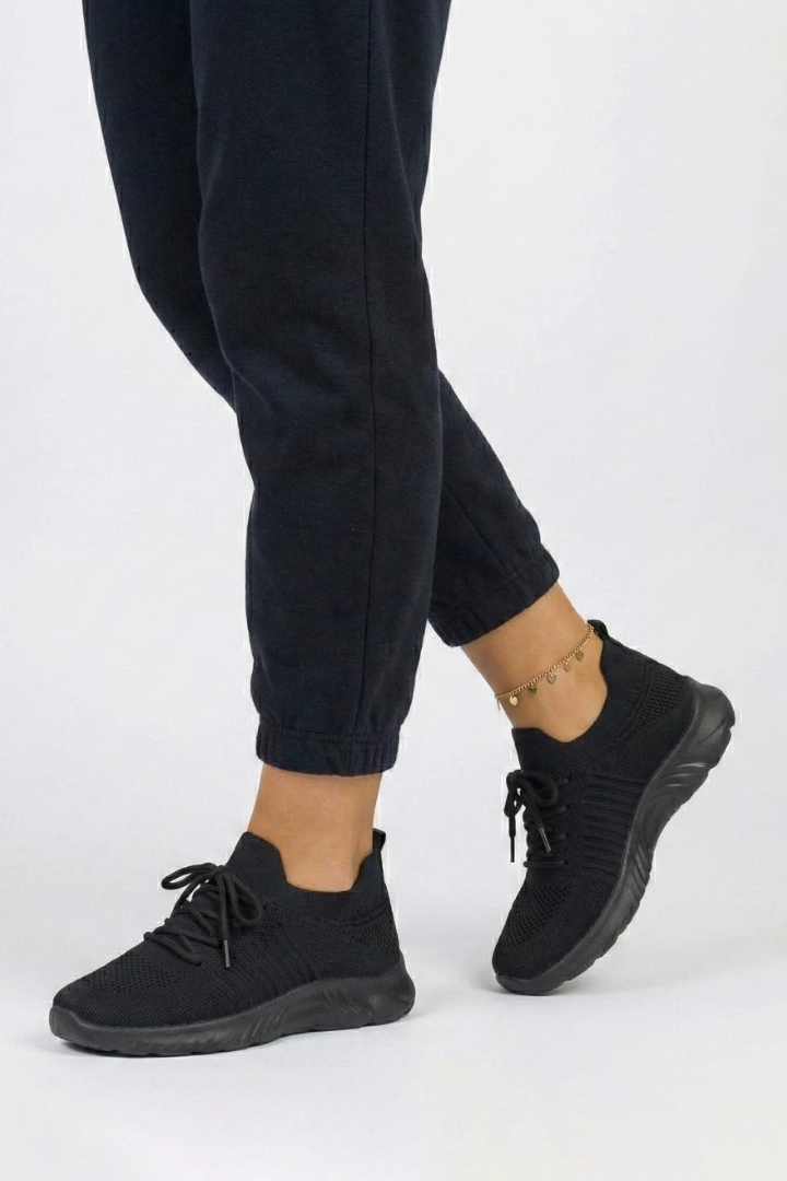 Stylish women's sneakers with secure laces & a durable textured sole for casual & active use.