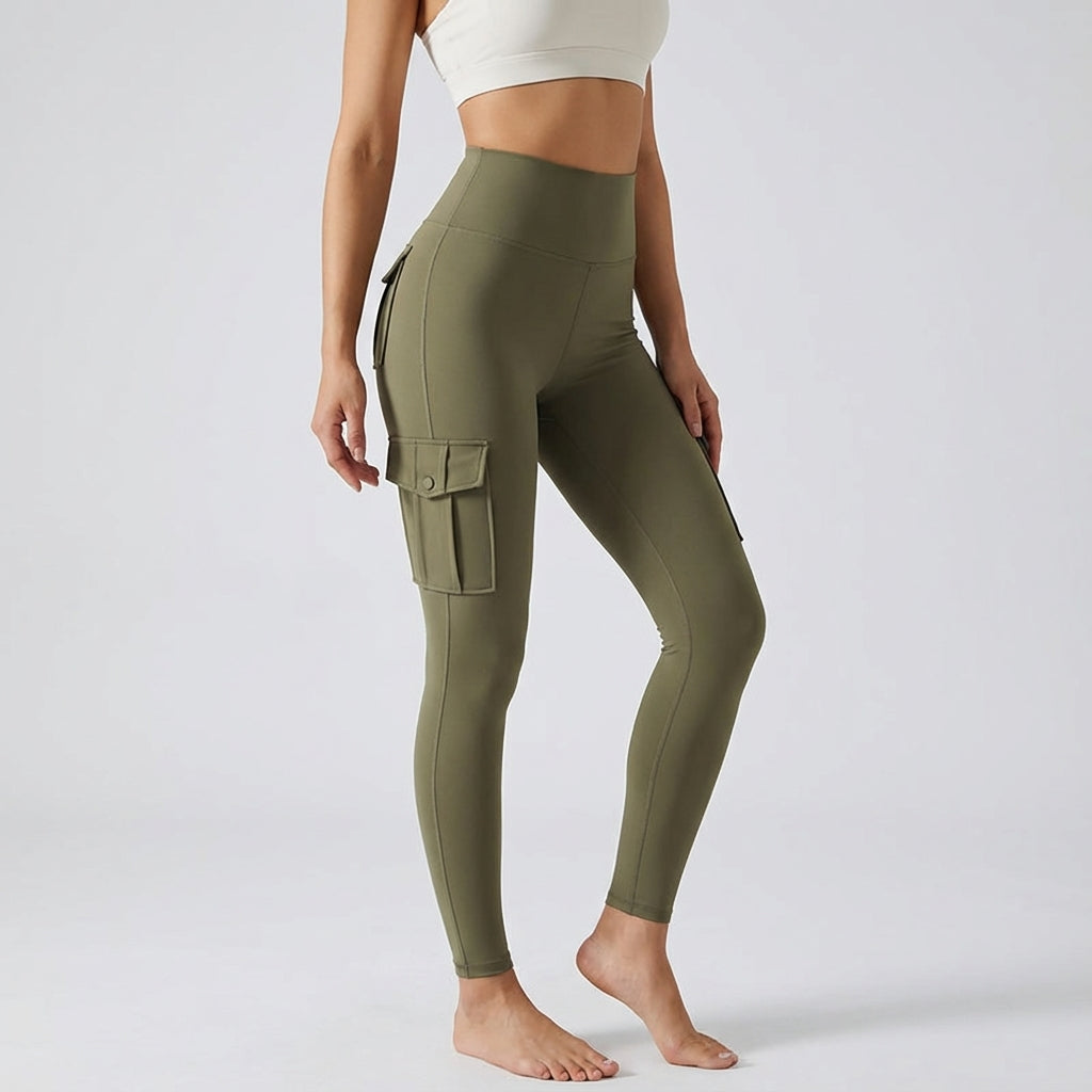 Modern women's sporty cargo leggings, high-waisted & stretchy, with pockets for versatile active & casual wear.
