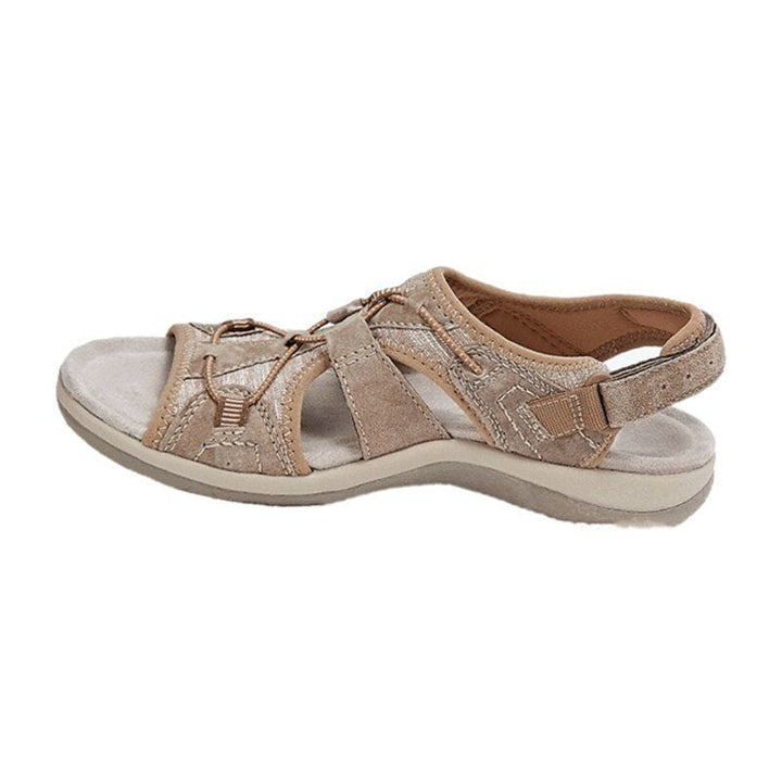 Women's strappy sandals with a cushioned footbed, ensuring sporty comfort for long wear.