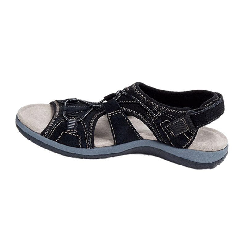 Women's sporty comfort sandals on a beach, ready for summer adventures and casual enjoyment.