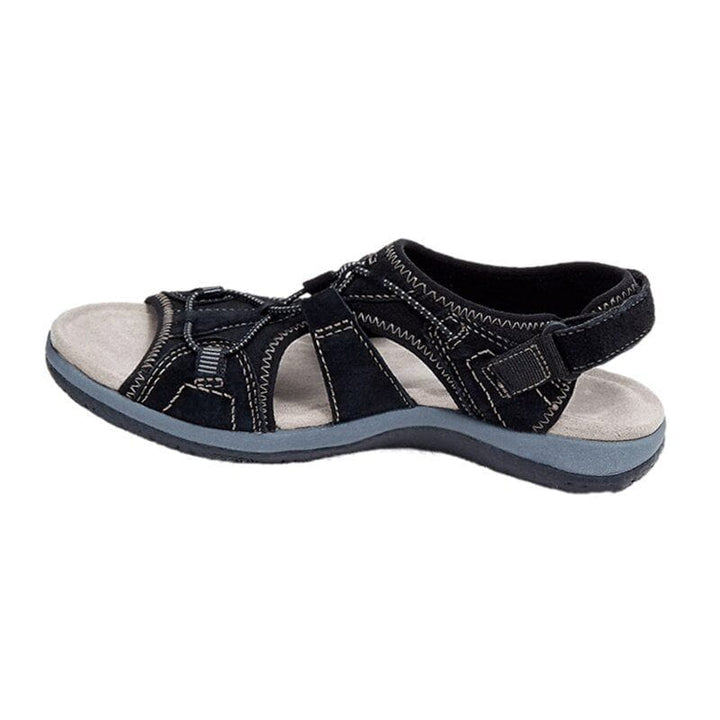 Women's sporty comfort sandals on a beach, ready for summer adventures and casual enjoyment.