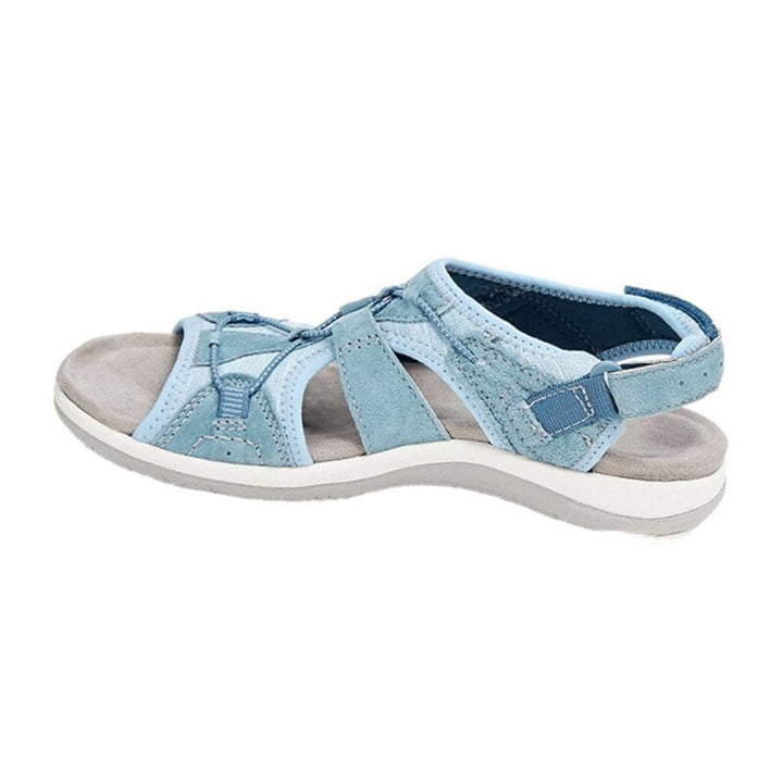 Side view of women's comfort sandals, highlighting the sporty silhouette and strappy upper.