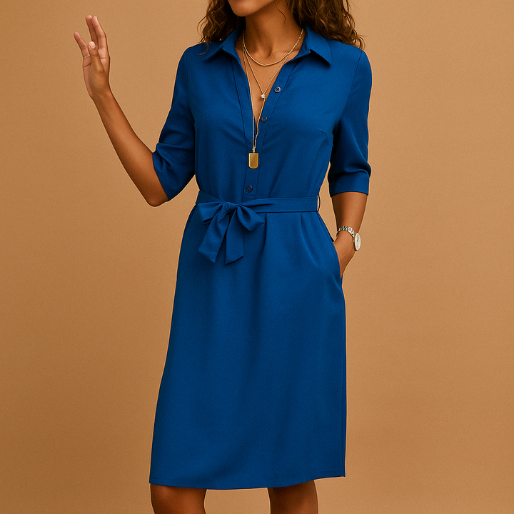 Fashionable women's belted button-down shirtdress, a versatile spring wardrobe essential.