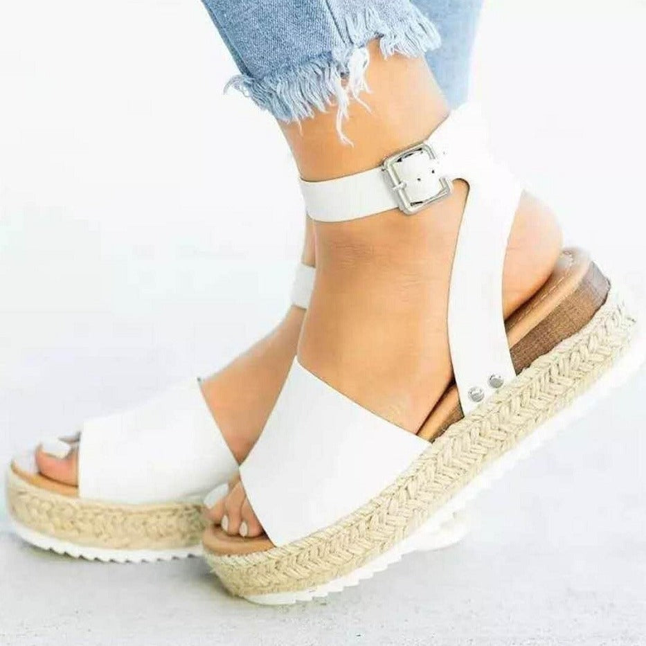 Stylish women's flatform sandals with an adjustable buckle ankle strap, ideal for summer