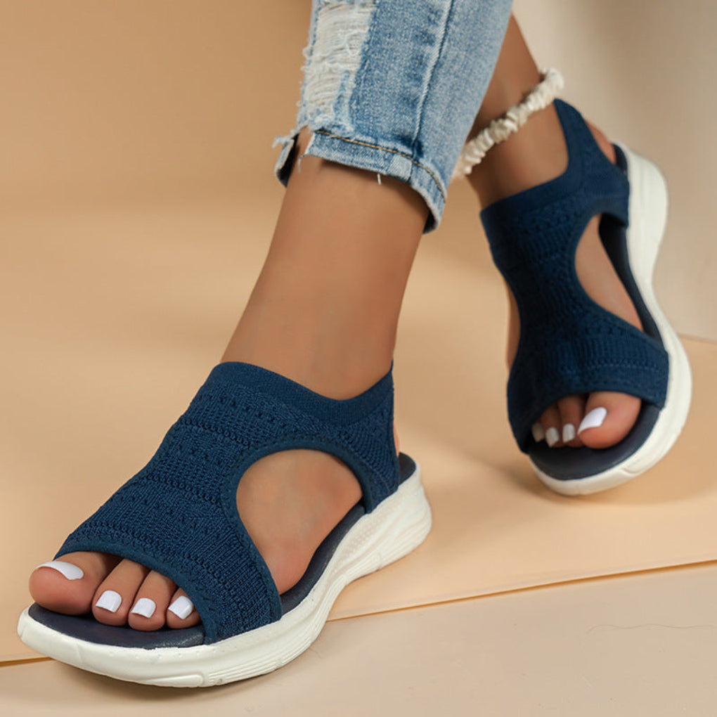 Stylish women's walking sandals with an open-toe design for spring and summer casual footwear.