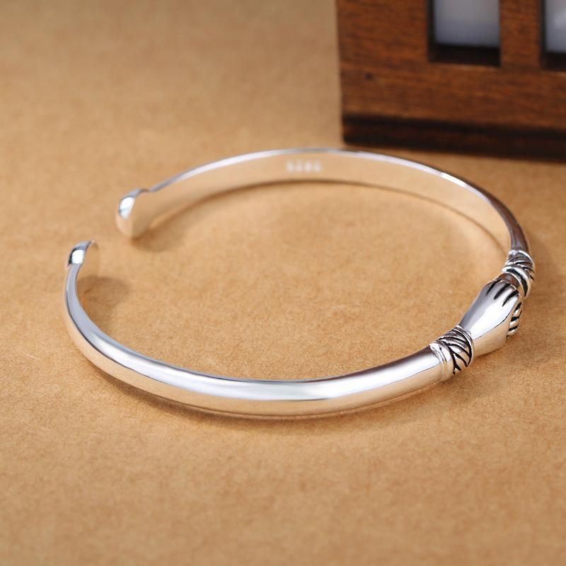Hypoallergenic sterling silver bracelet with a unique handshake design, women's jewelry