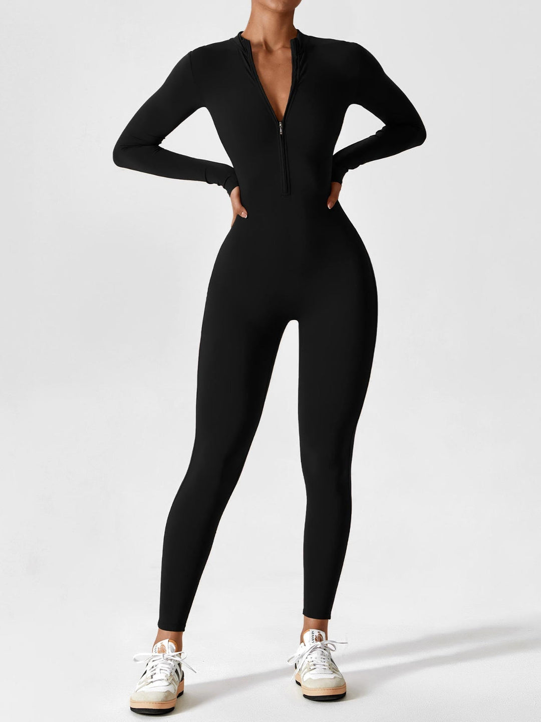 Women's stretchy zip-up jumpsuit in a vibrant spring color, casual and comfortable one-piece outfit