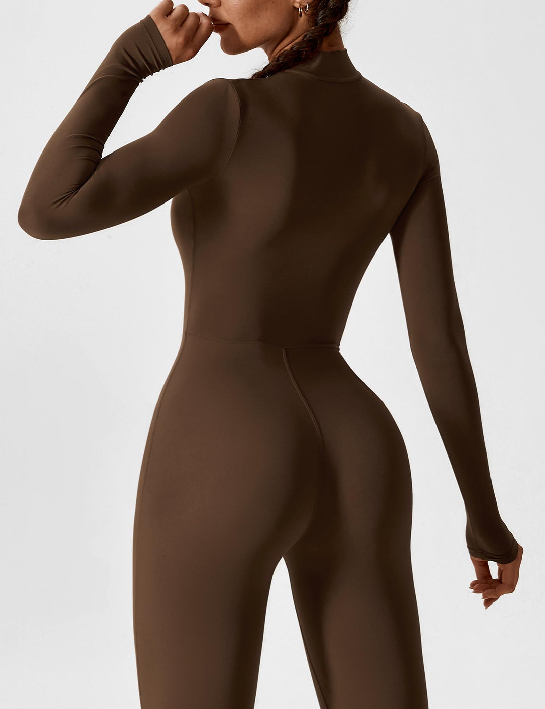 Close-up of the fabric texture of a women's stretchy zip-up jumpsuit, soft and comfortable for spring