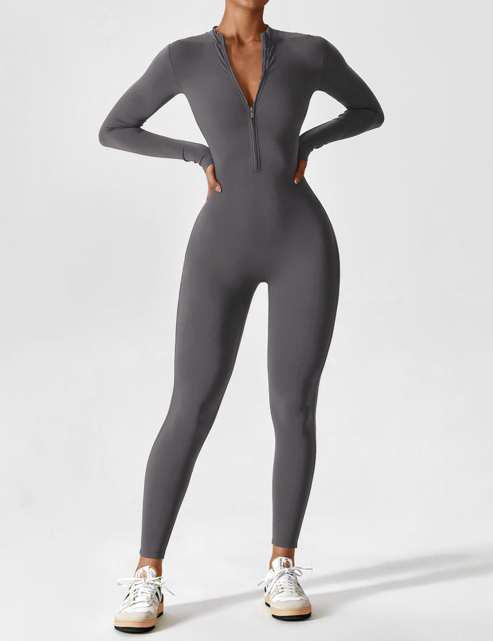 Stylish women's stretchy jumpsuit with a functional zipper, an essential spring onepiece garment