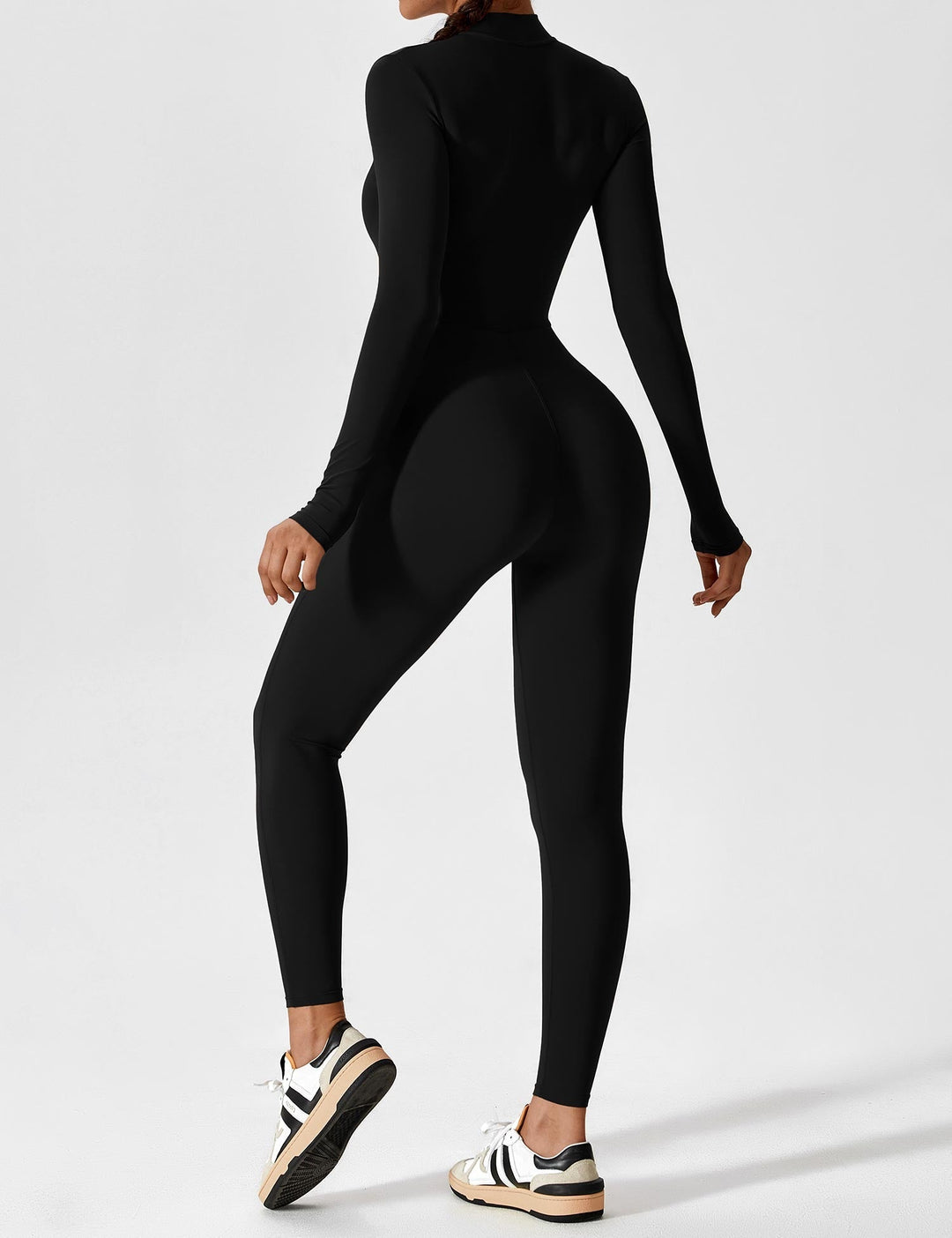 Full-length view of a women's versatile stretchy jumpsuit with a front zipper, perfect for spring fashion