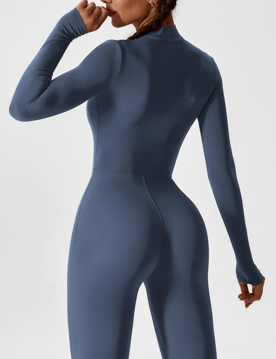 Fashionable women's onepiece jumpsuit, stretchy and zip-up, ideal for a chic spring look