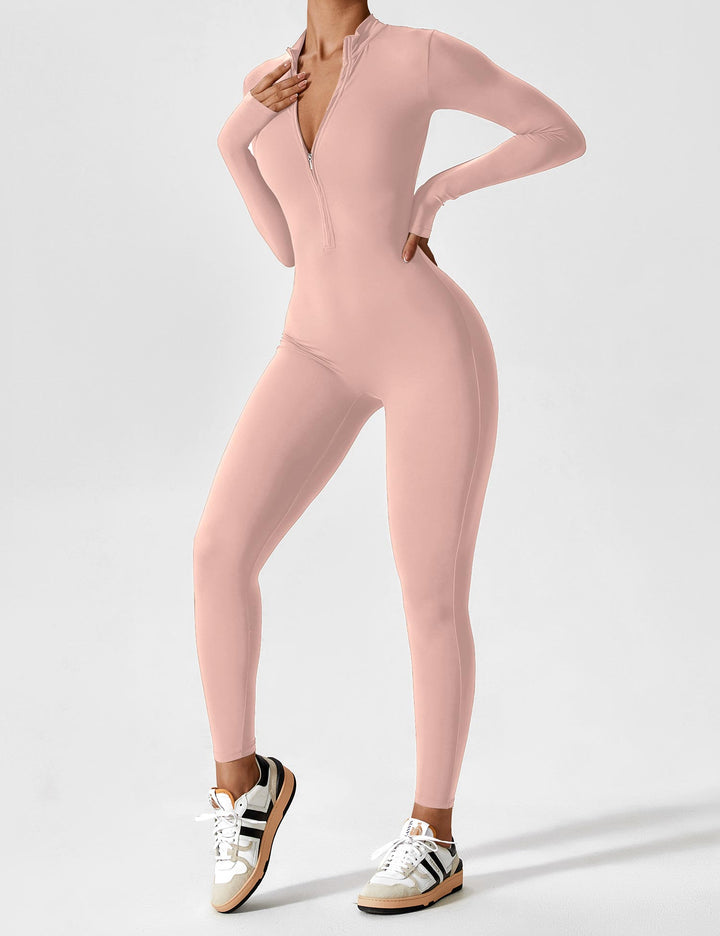 Woman posing in a comfortable stretchy zip-up jumpsuit, capturing the essence of spring style