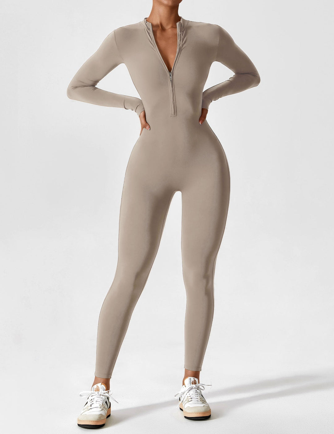 Casual women's stretchy zip-up jumpsuit with wide legs, offering ultimate comfort for spring