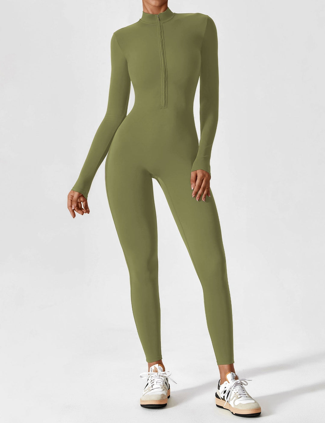 Women's comfortable stretchy zip-up jumpsuit paired with sneakers, a perfect spring casual combo