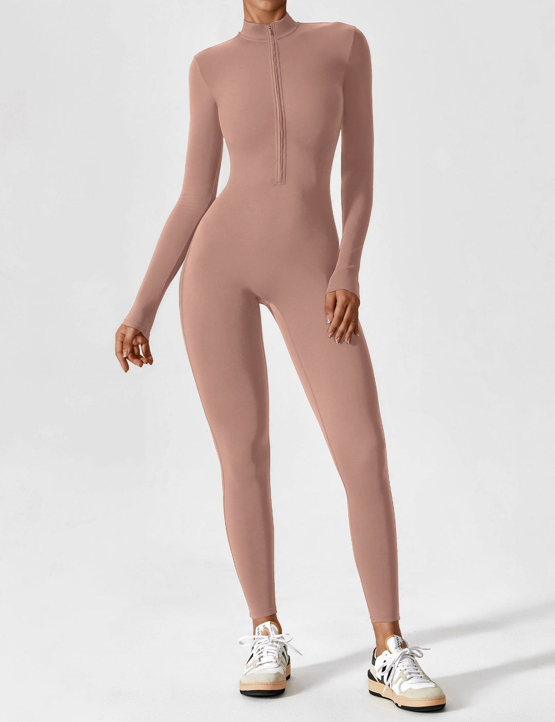 Full view of a women's stretchy jumpsuit, showcasing the flattering line created by the zip for spring