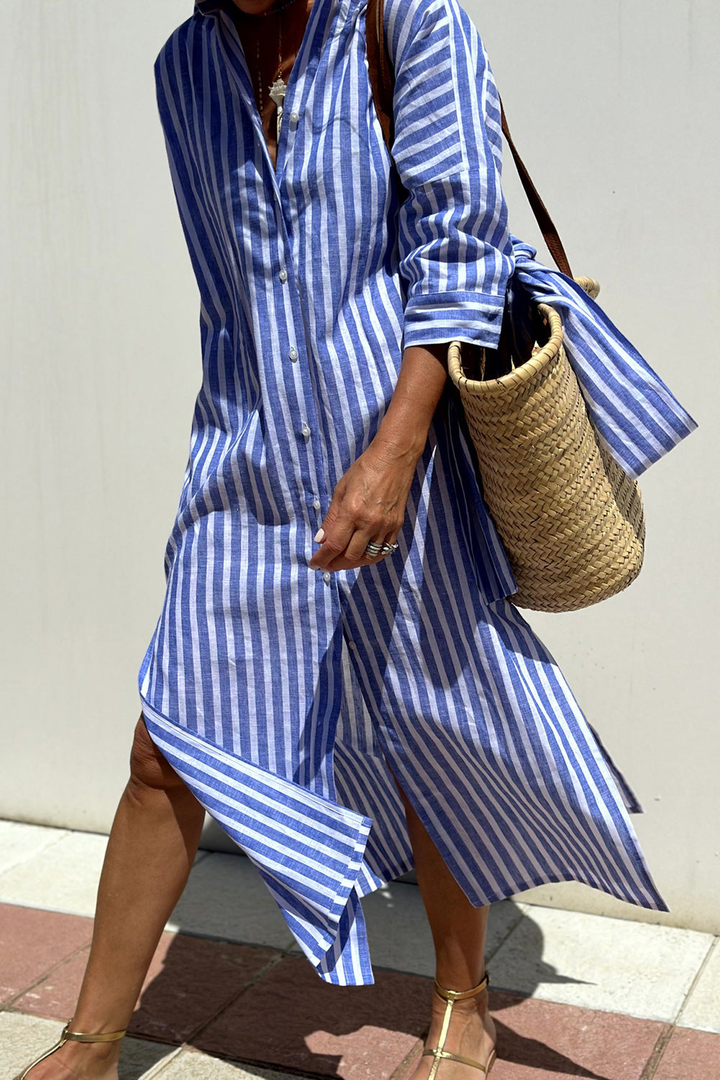 Elegant printed striped midi dress for women, collared & button-down, a chic summer casual option.